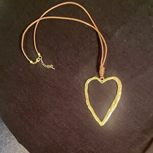 Artisan Gold Heart Necklace with Brown Cord
Approximately 20” long